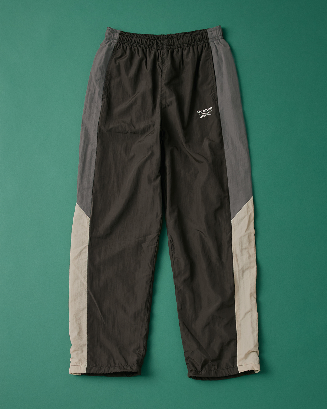 Reebok（リーボック）別注ナイロントラックパンツ DK.GRAY