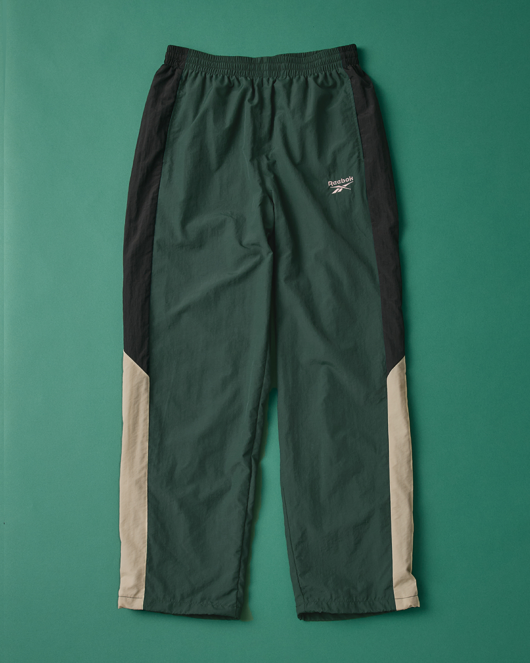 Reebok（リーボック）別注ナイロントラックパンツ KELLY